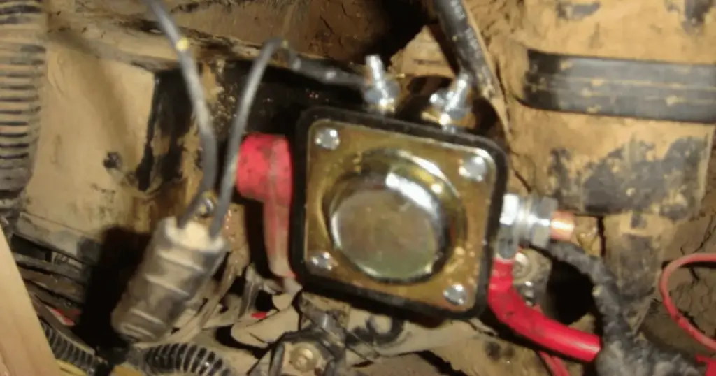 A mud covered started solenoid from a Polaris Ranger
