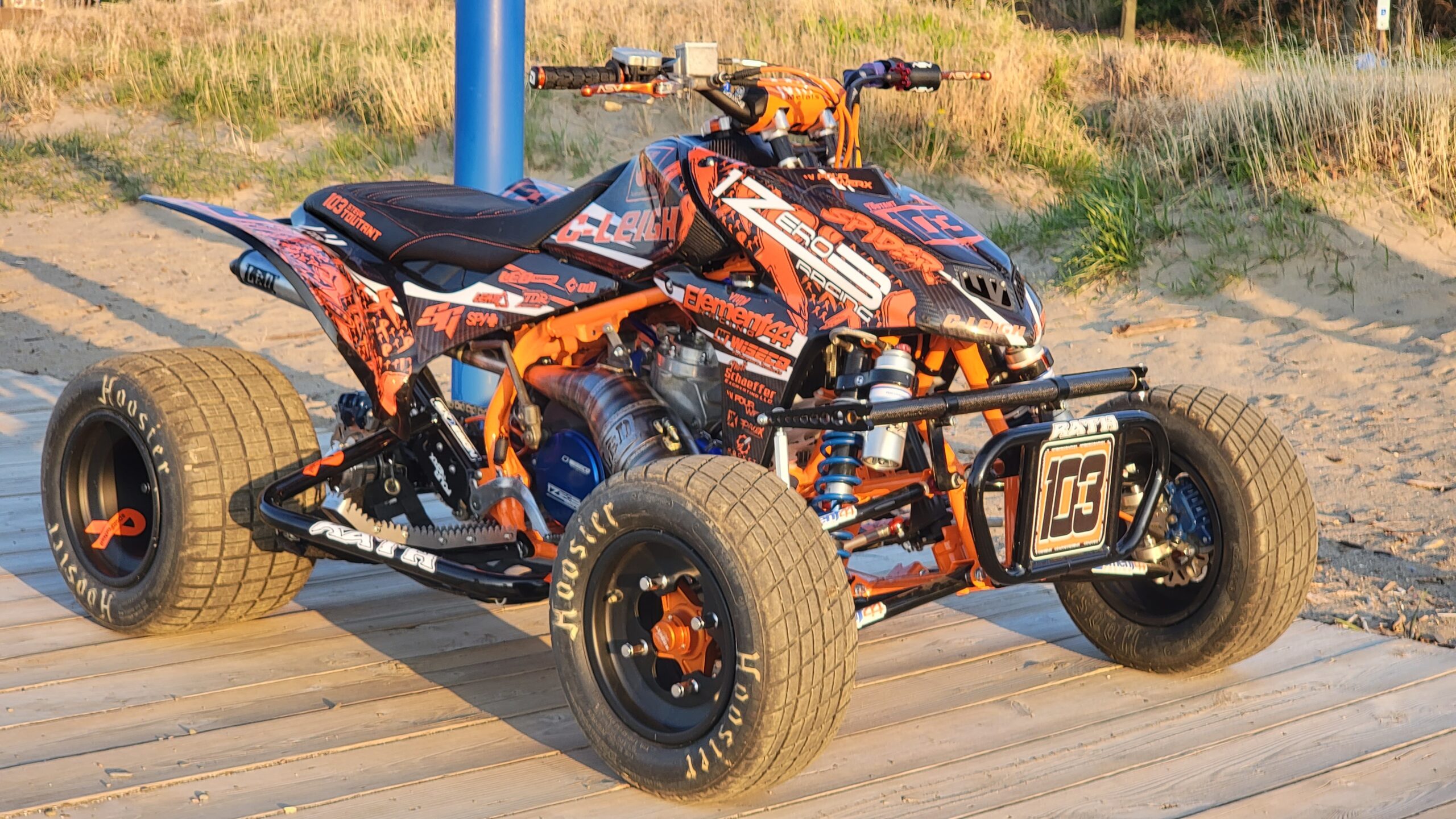 This is a Polaris Ranger in custom orange and black race livery.