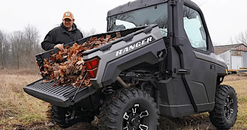 Example of a Polaris Ranger hauling leaves, a light-duty activity that will promote a longer lifespan for the Ranger